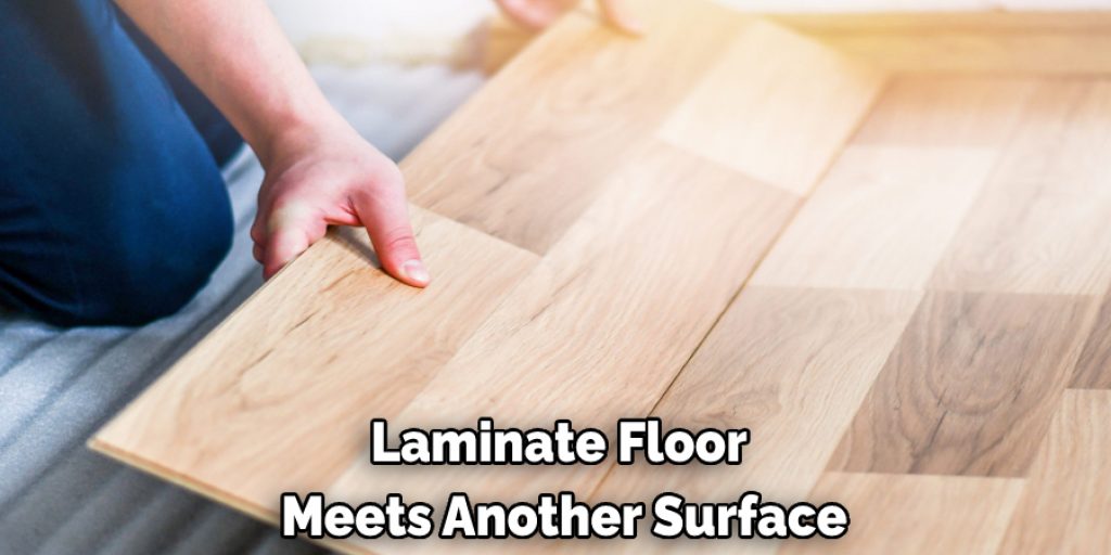 Laminate Floor  Meets Another Surface
