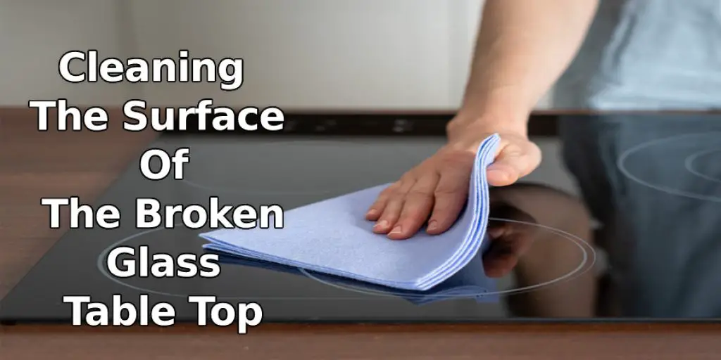 Cleaning The Surface Of The Broken Glass Table Top