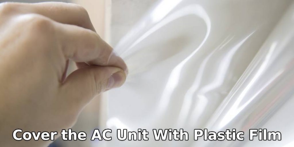 Cover the AC Unit With Plastic Film
