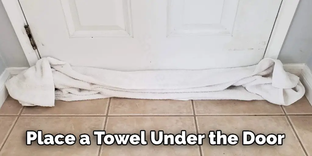 Place a Towel Under the Door