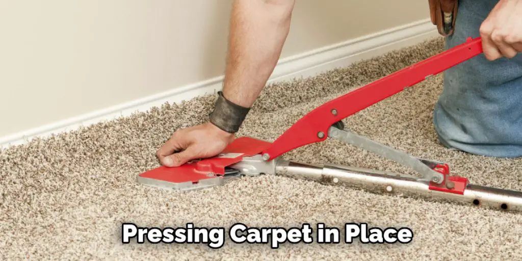 Pressing Carpet in Place