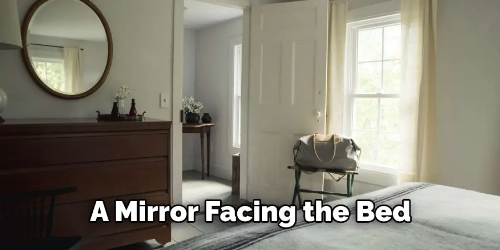 A Mirror Facing the Bed
