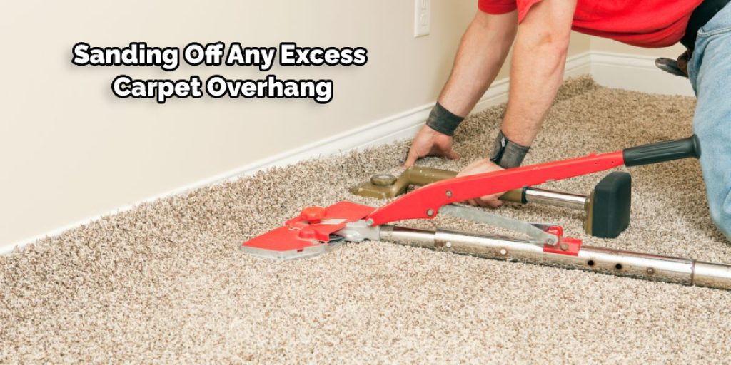 Sanding Off Any Excess Carpet Overhang