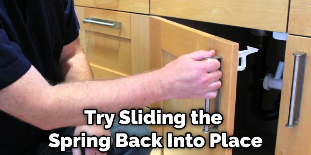 Try Sliding the Spring Back Into Place