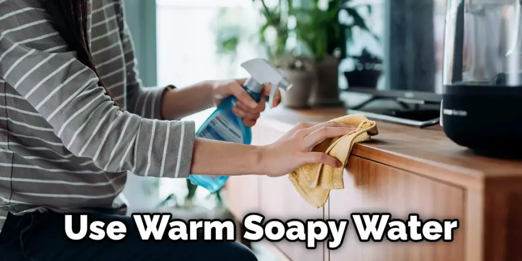 Use Warm Soapy Water
