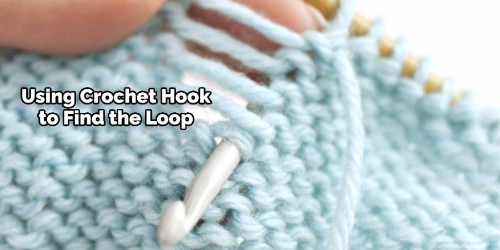 Using Crochet Hook to Find the Loop 