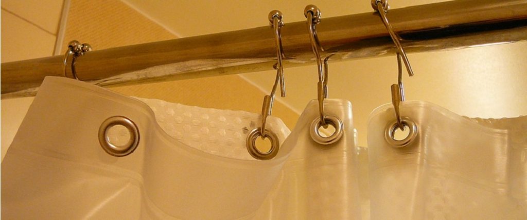 How to Unlock a Shower Curtain Rod