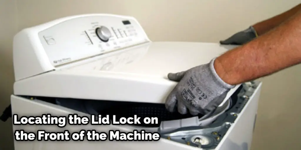 Locating the Lid Lock on the Front of the Machine