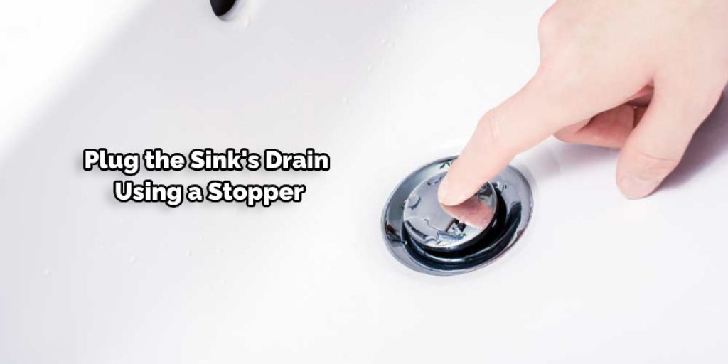 Plug the Sink's Drain Using a Stopper