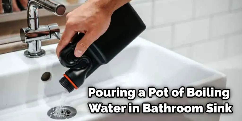 Pouring a Pot of Boiling Water in Bathroom Sink