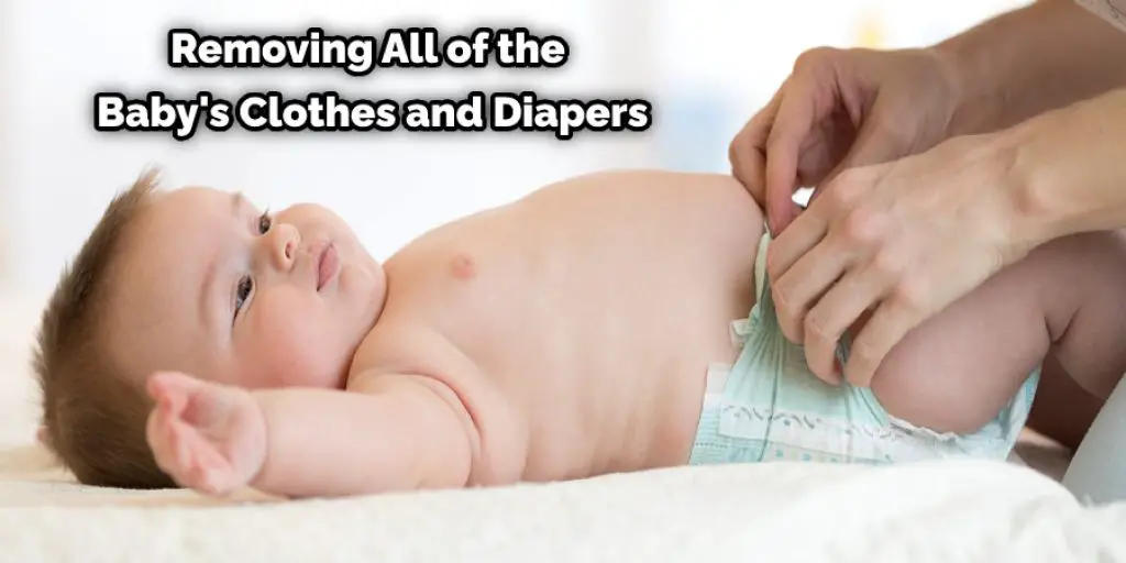 Removing All of the Baby's Clothes and Diapers