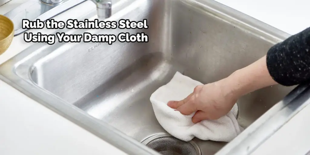 Rub the Stainless Steel Using Your Damp Cloth