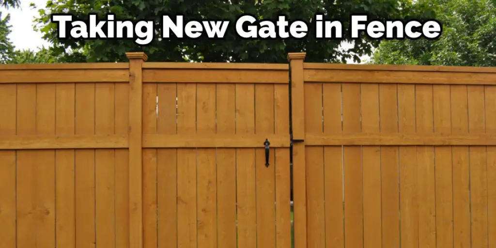 Taking New Gate in Fence