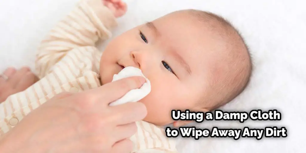 Using a Damp Cloth to Wipe Away Any Dirt