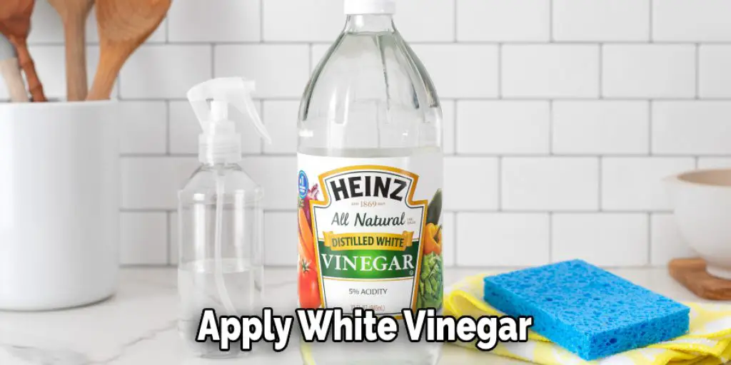 Apply White Vinegar