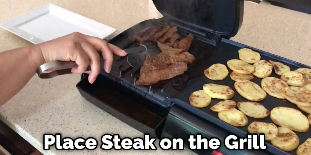 Place Steak on the Grill