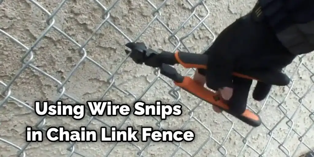 Using Wire Snips in Chain Link Fence