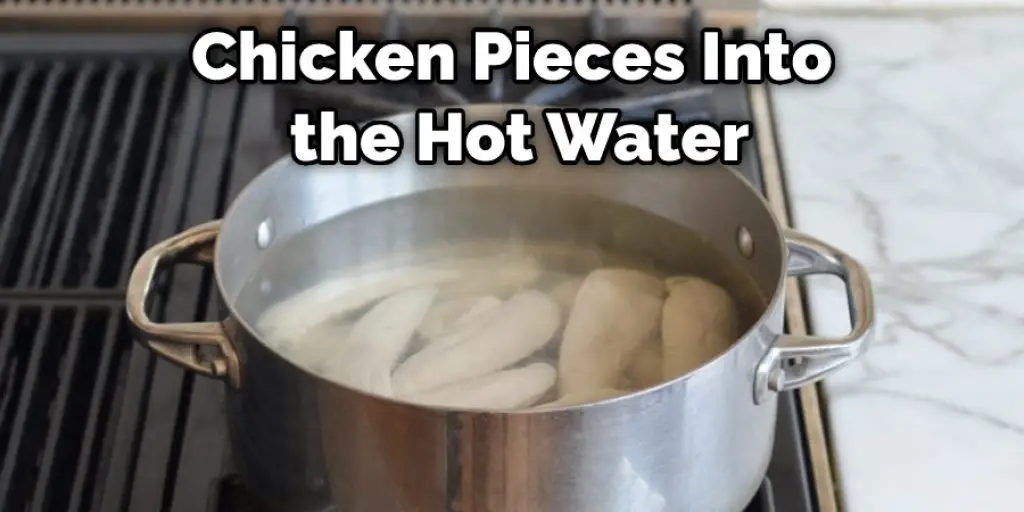 Chicken Pieces Into  the Hot Water