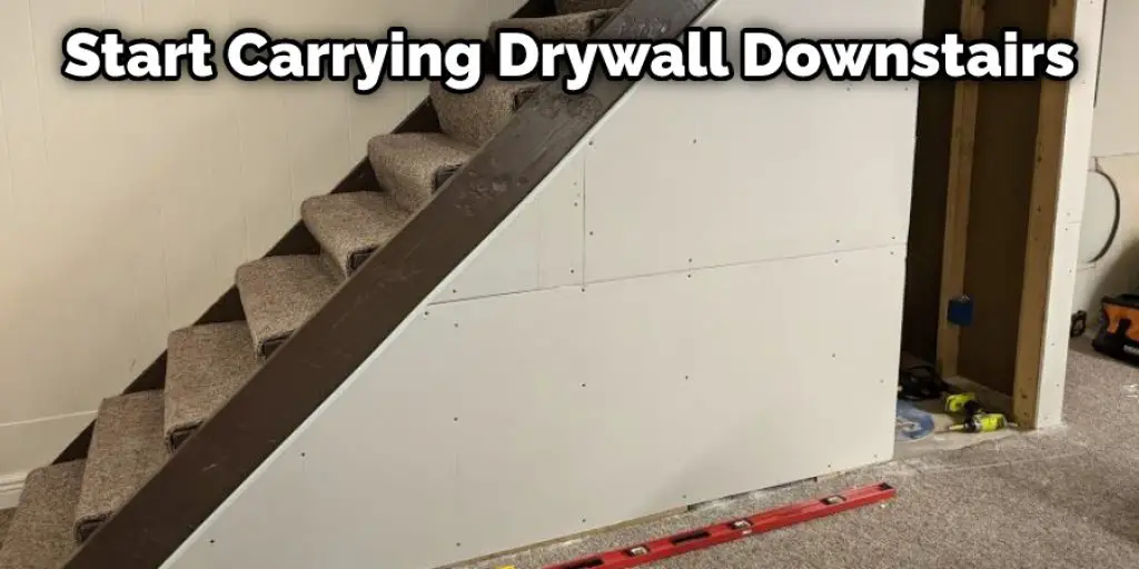 Start Carrying Drywall Downstairs