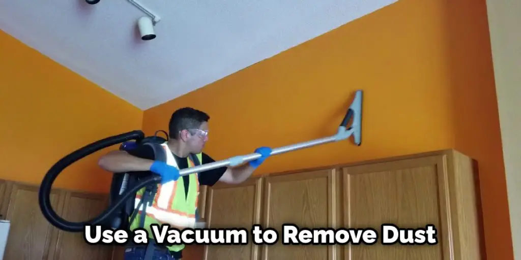 Use a Vacuum to Remove Dust