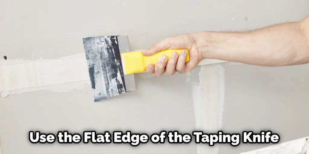 Use the Flat Edge of the Taping Knife
