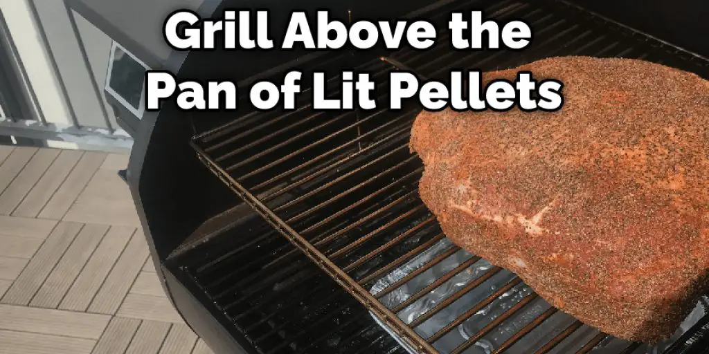 Grill Above the Pan of Lit Pellets