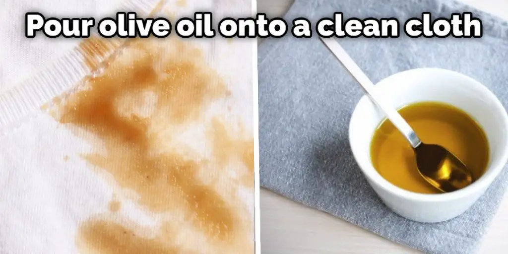Pour olive oil onto a clean cloth