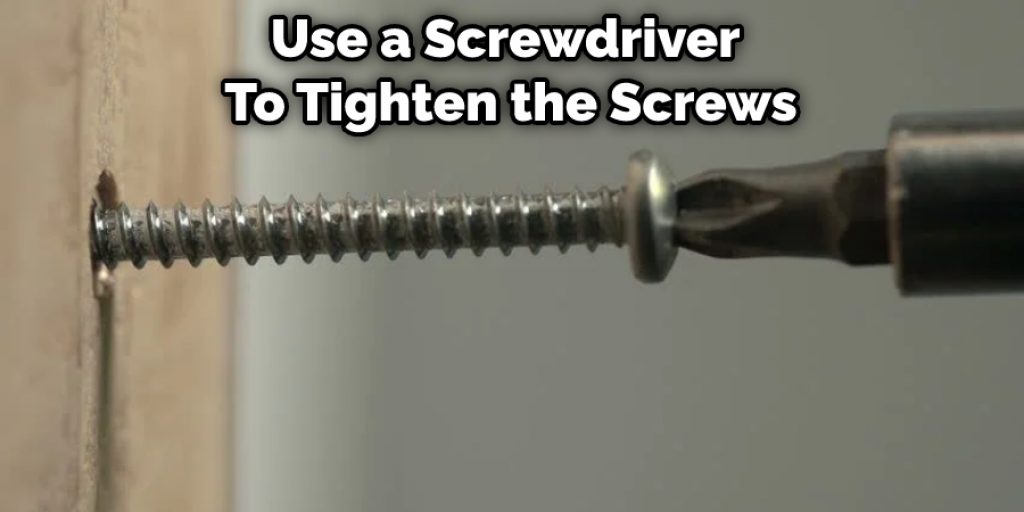Use a Screwdriver  To Tighten the Screws