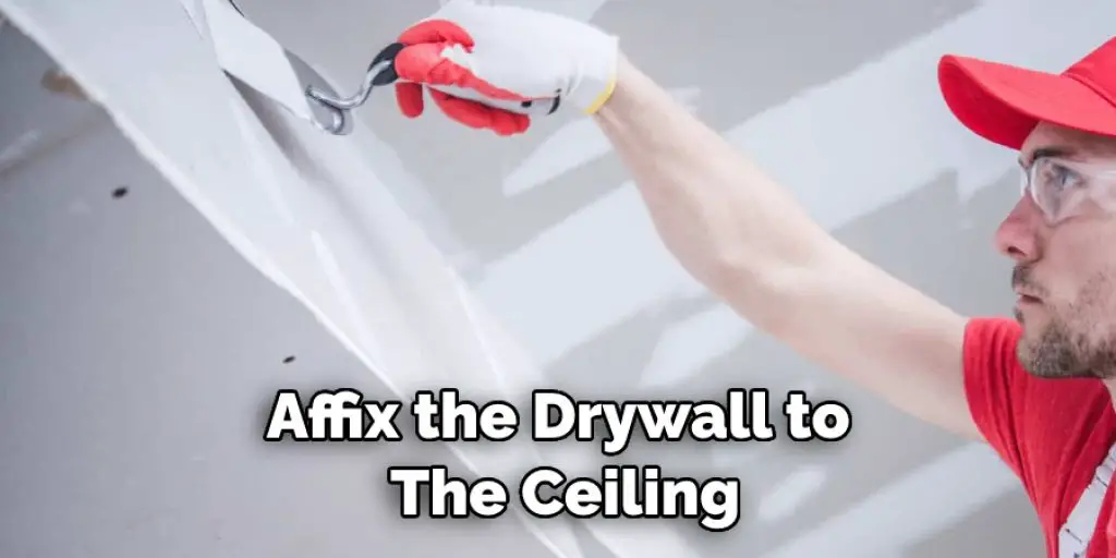 Affix the Drywall to  The Ceiling