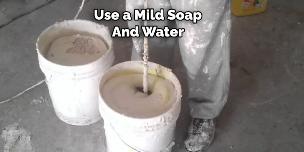 Use a Mild Soap  And Water 