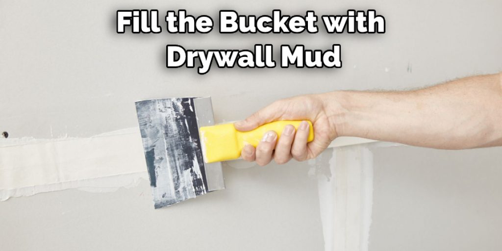 Fill the Bucket with  Drywall Mud