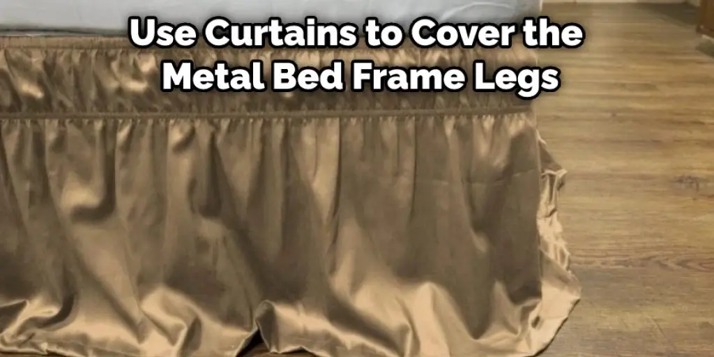 Use Curtains to Cover the Metal Bed Frame Legs