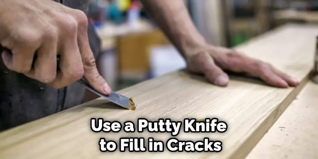 Use a Putty Knife to Fill in Cracks
