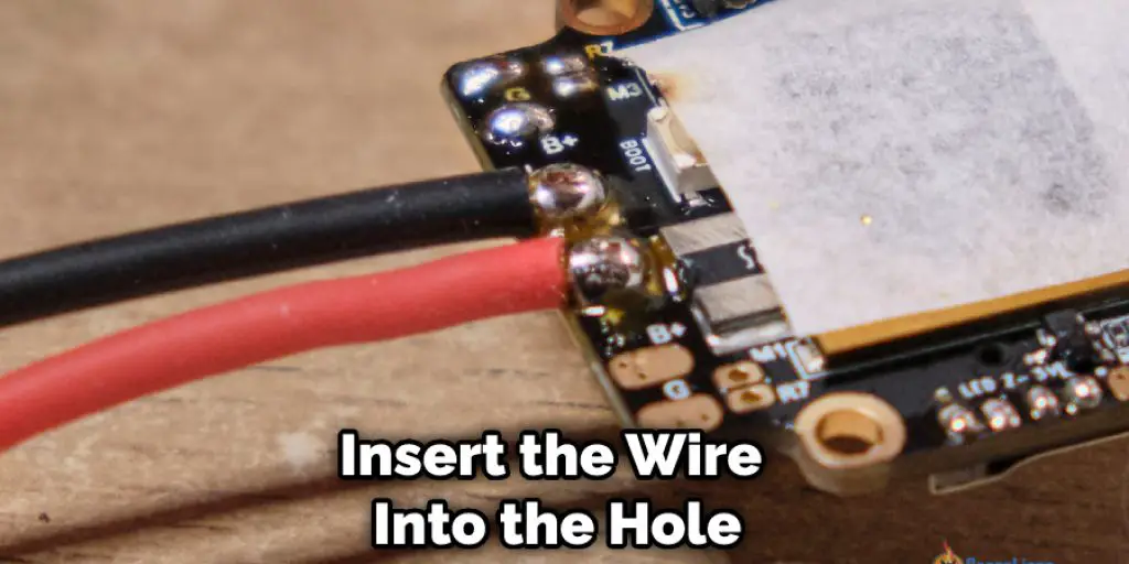 Insert the Wire Into the Hole